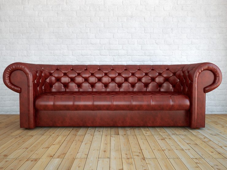 Klassisch und bequem: ein Chesterfield Sofa. (Bild: © Pixelwolf - Fotolia.com)